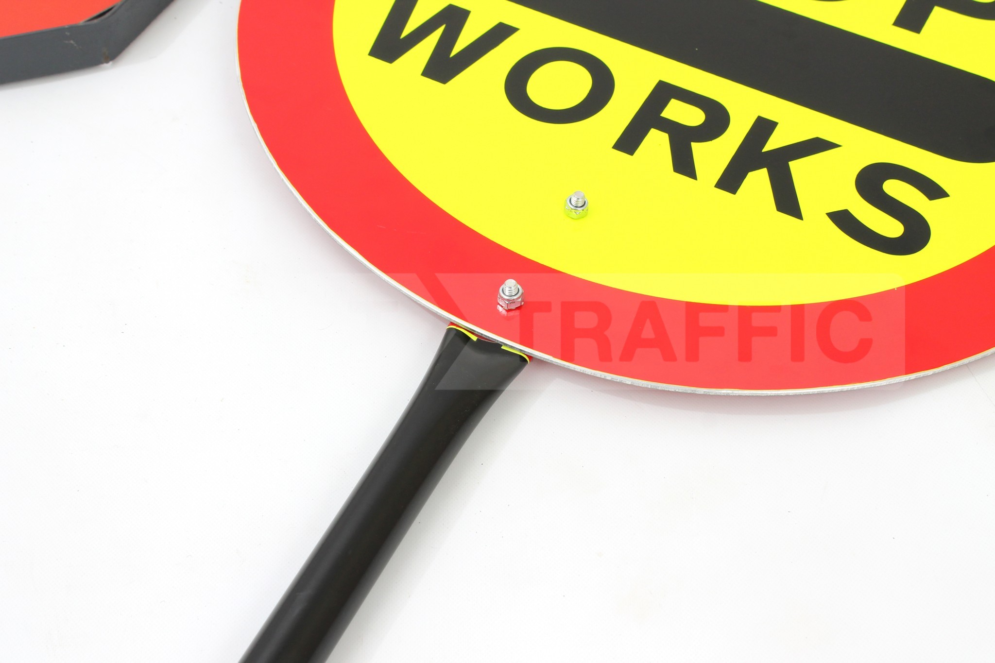 STOP WORKS sign with fixed pole