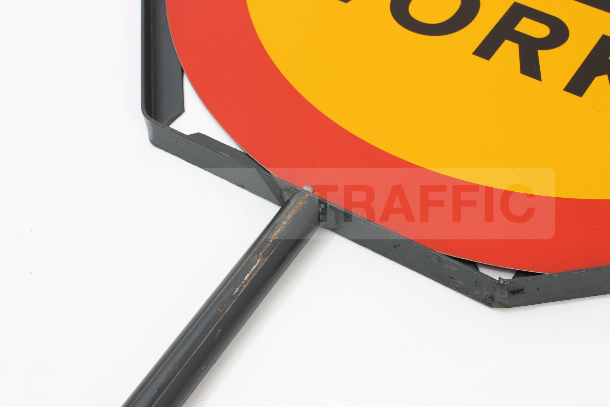 stop-works-sign-steel-rigid-stem-closeup